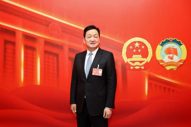 全国人大代表、牧原股份董事长秦英林：坚持自主育种 突破种猪限制
